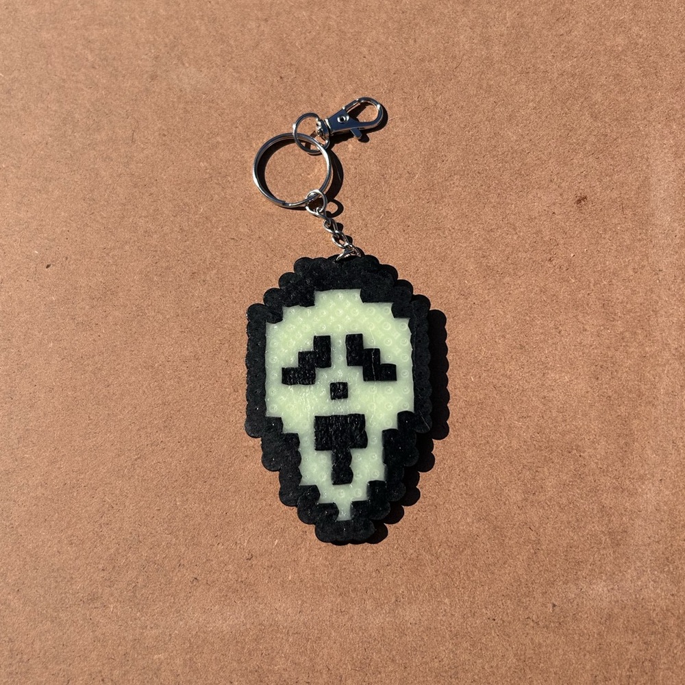 Glow in the dark ghost face perler bead keychain